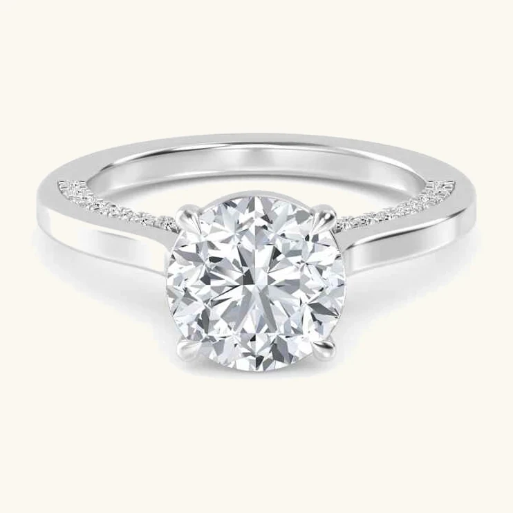 Wick, Four Prong Round Solitaire, Pavé Band in White Gold, round