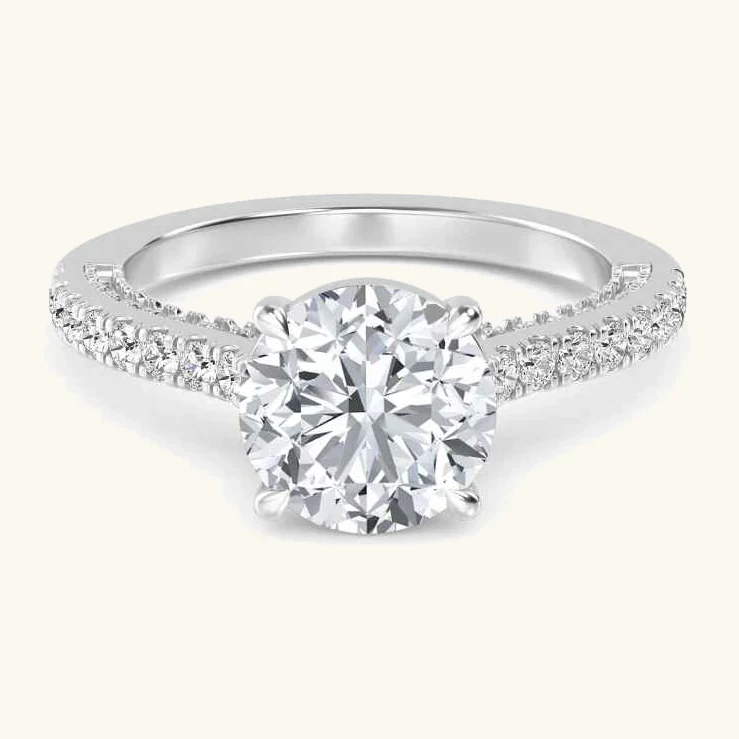 Keel, Four Prong Round Solitaire, Pavé Band in White Gold, round