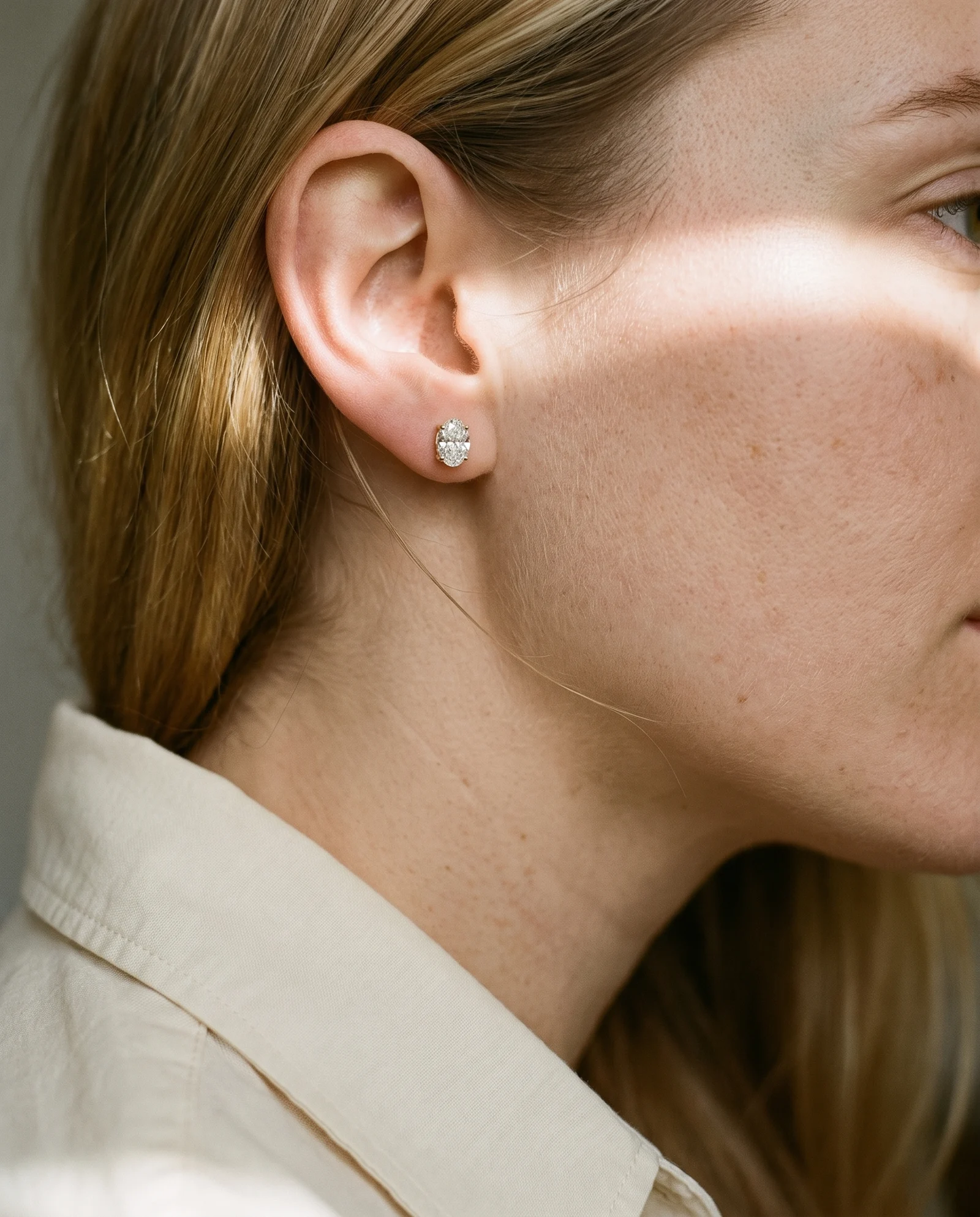 Noon, Four Prong Studs in Yellow Gold, oval, worn