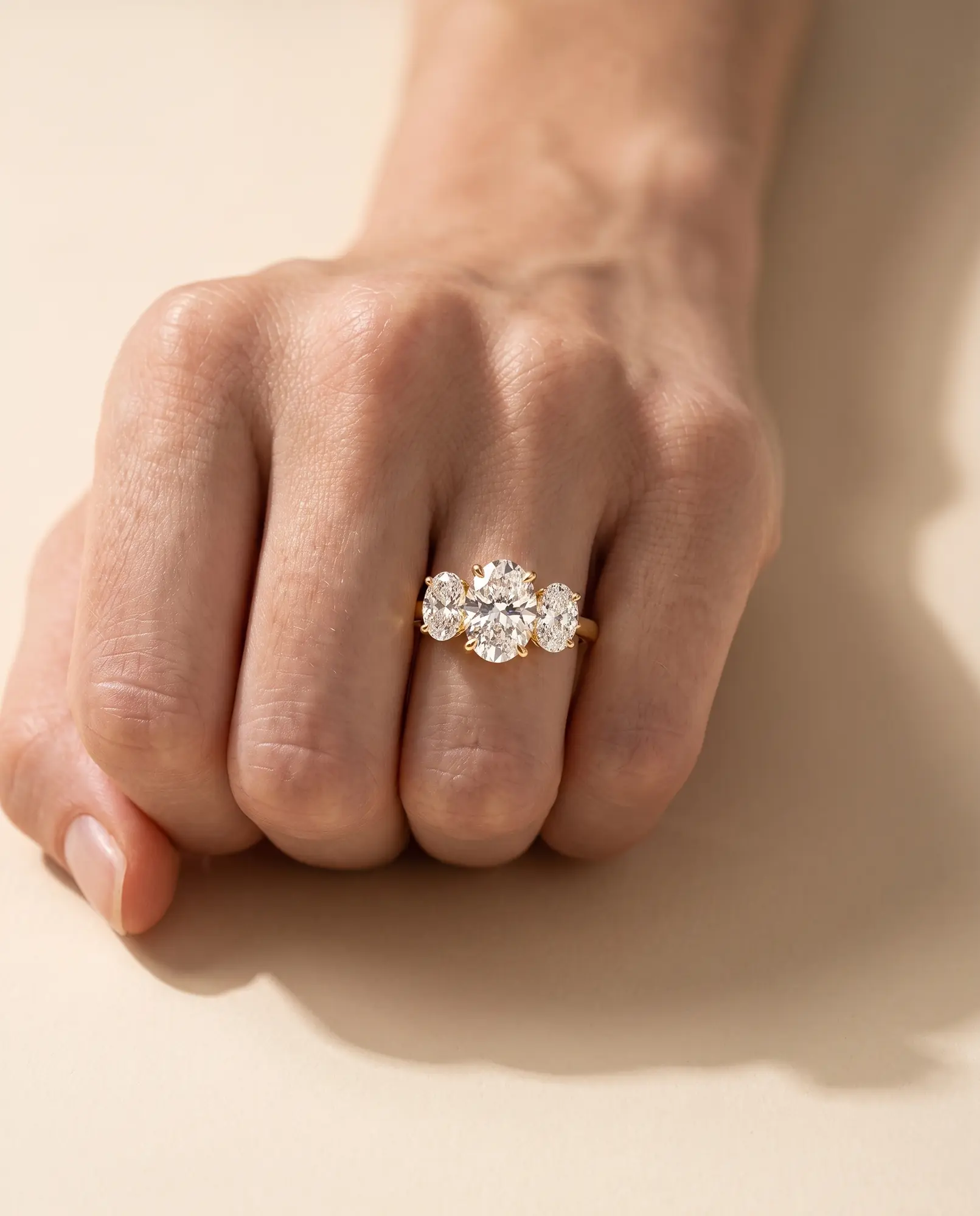 Story, Oval Three-Stone Ring in Yellow Gold, oval, worn, detail