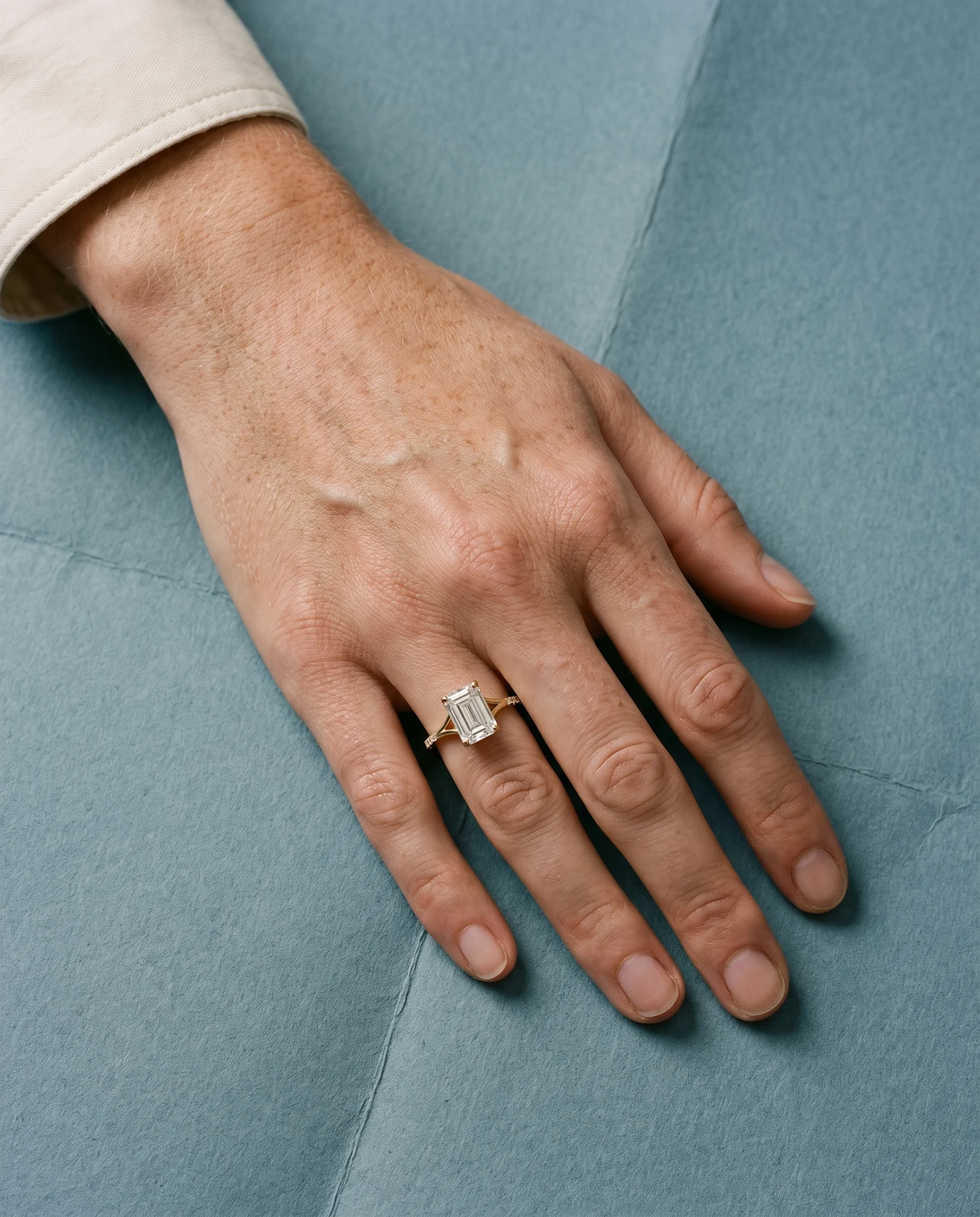 Dhriya, Four Prong Emerald Solitaire, Pavé Band, Split Shank in Yellow Gold, emerald, worn