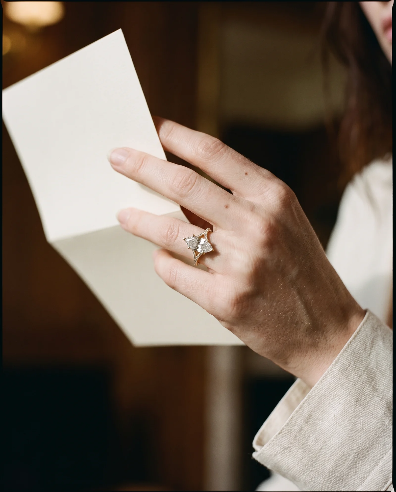 Lark, Four Prong Step-cut marquise Solitaire, Pavé Band in Yellow Gold, marquise, worn