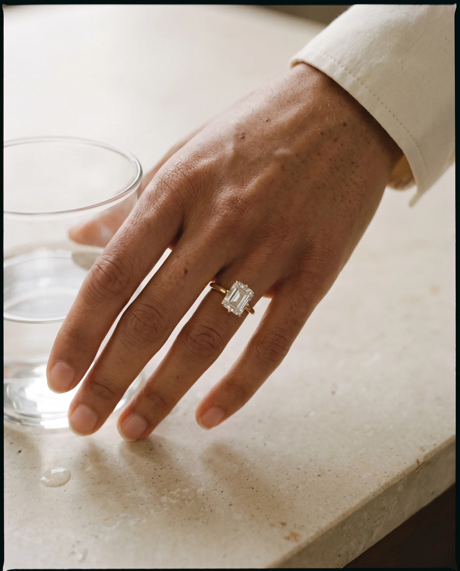 Harbour, Four Prong Emerald East-West Solitaire, Hidden Halo in Yellow Gold, emerald, worn