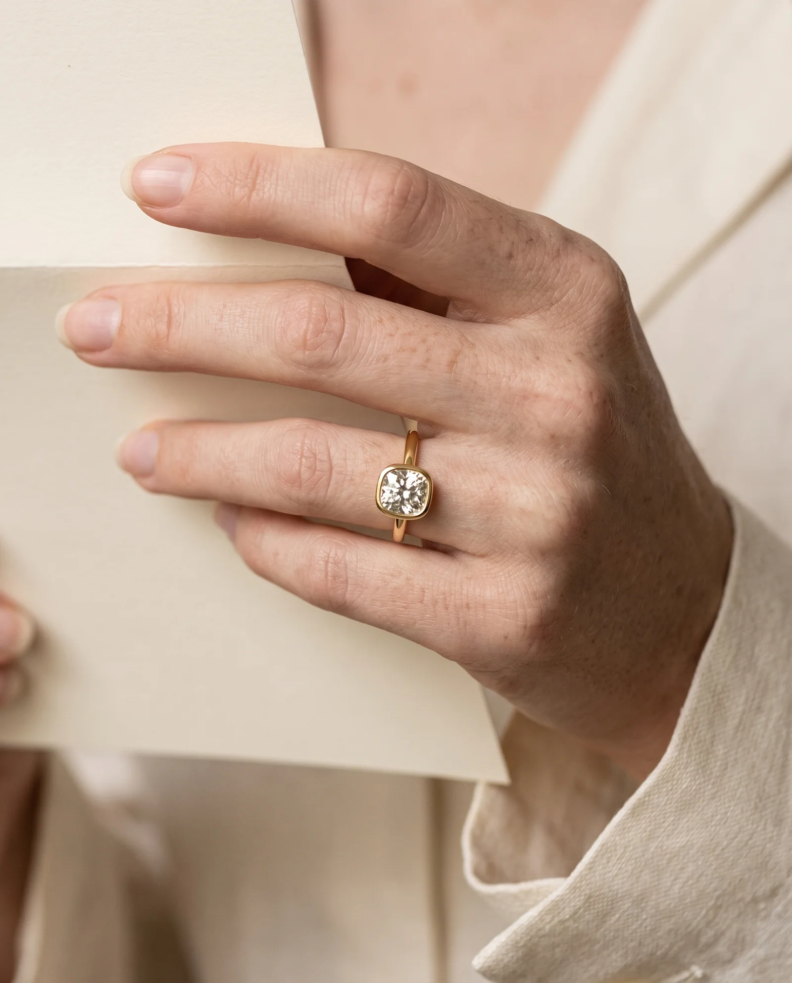 Ink, Four Prong Cushion Solitaire in Yellow Gold, cushion, worn