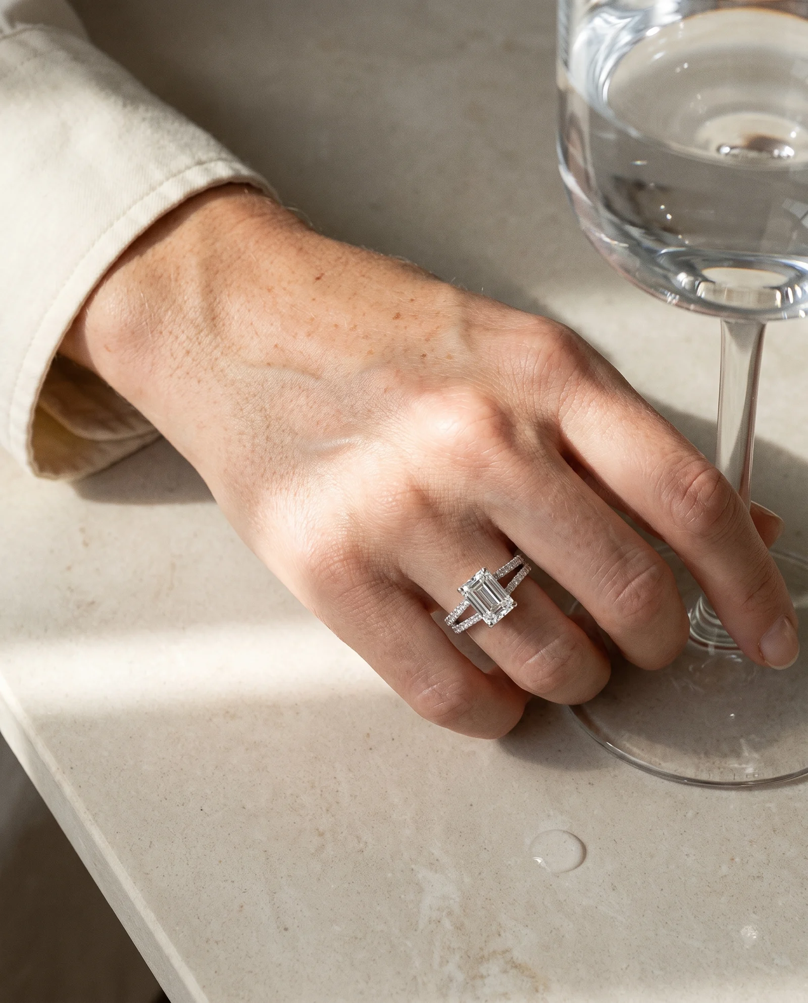 Alder, Four Prong Emerald Solitaire, Pavé Band, Split Shank in White Gold, emerald, worn
