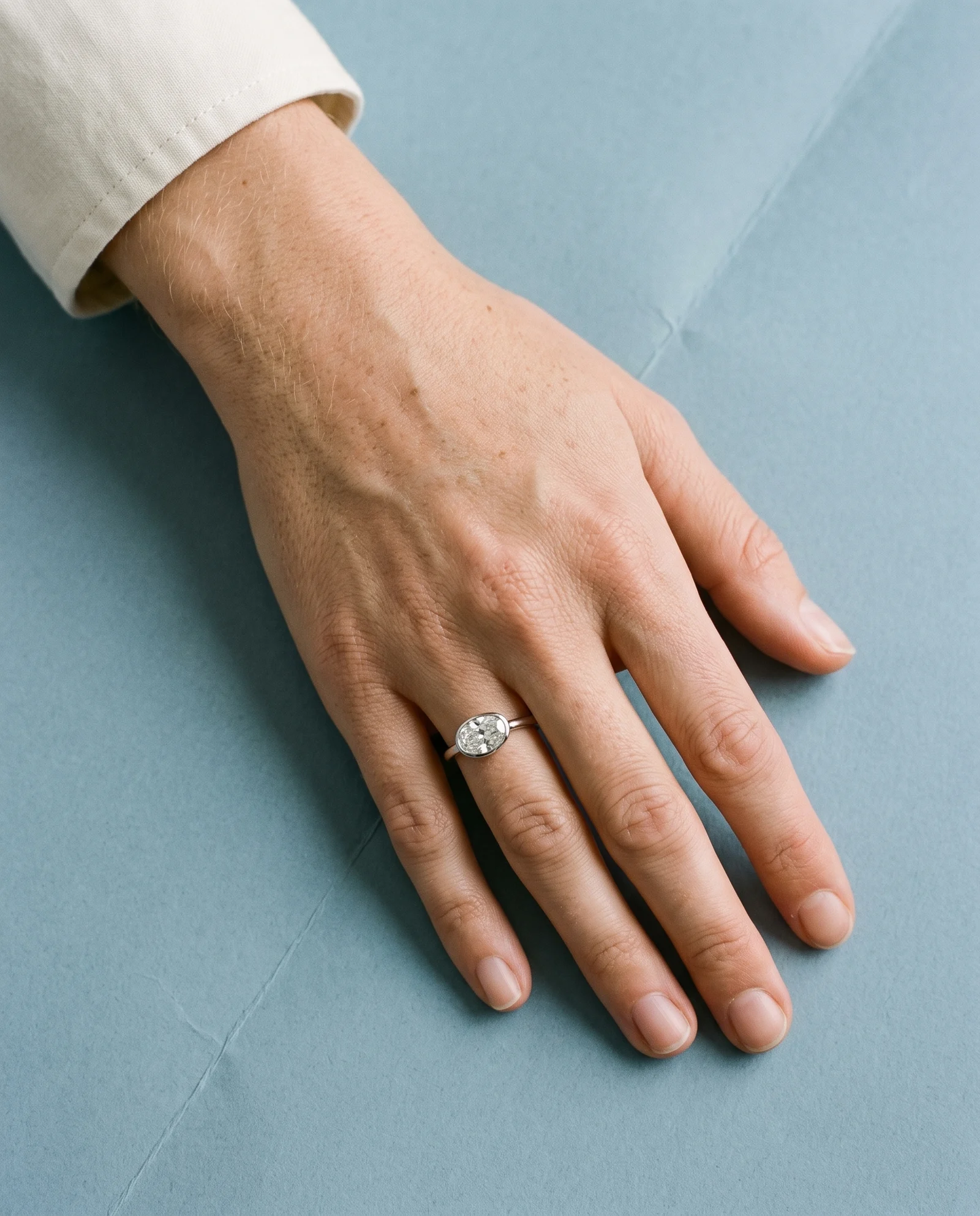 Wake, Four Prong Oval East-West Solitaire in White Gold, oval, worn