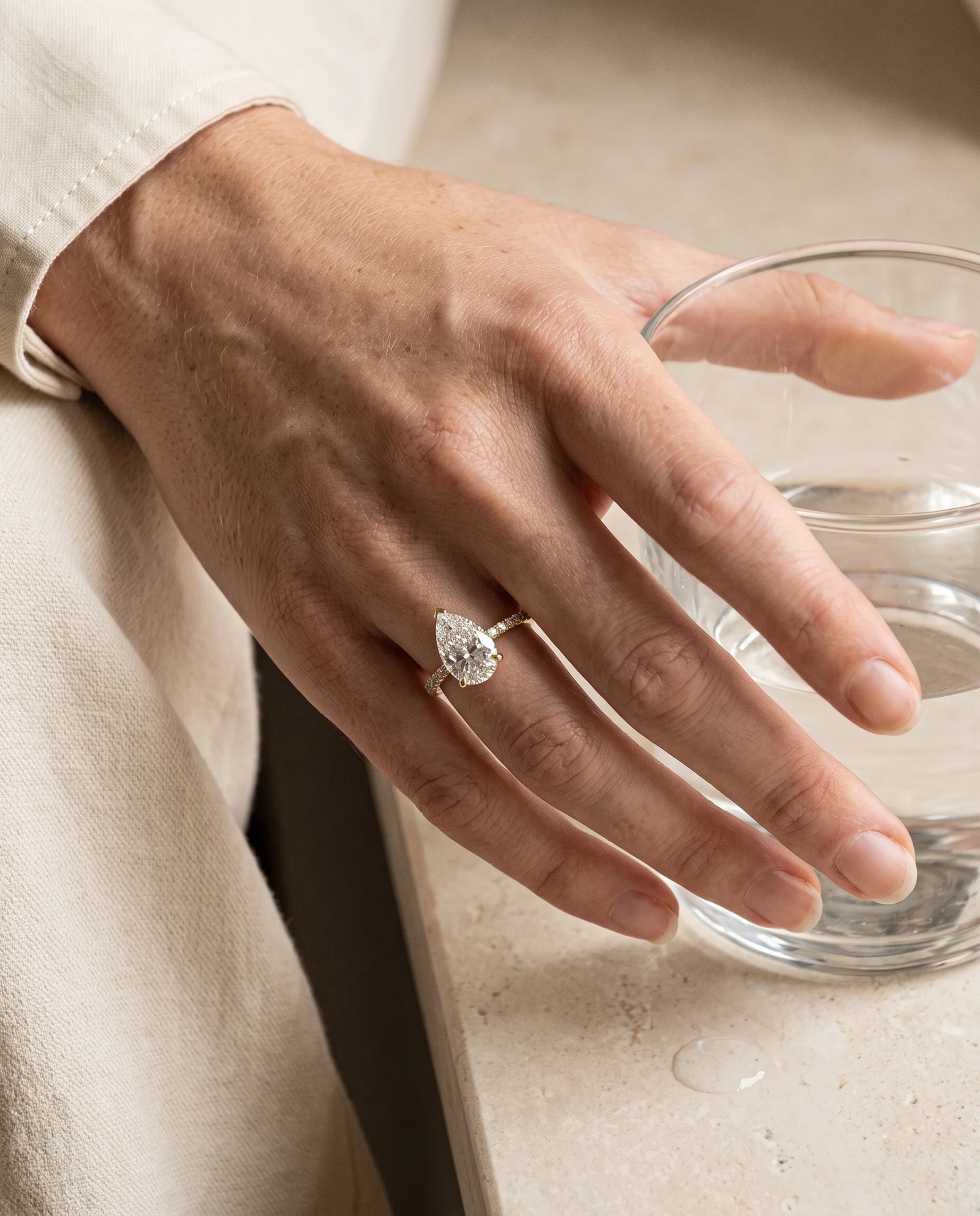 Lune, Three Prong Pear Solitaire, Pavé Band in Yellow Gold, pear, worn