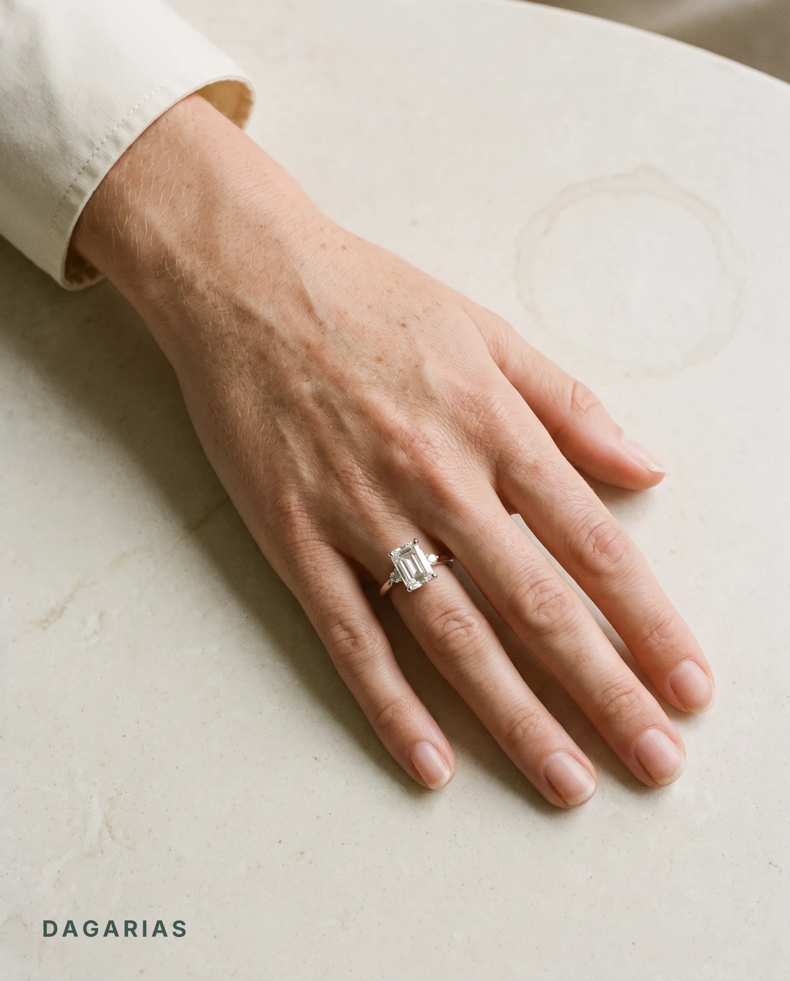 Marsh, Four Prong Emerald Solitaire, Two Small Stones Each Side in White Gold, emerald, worn