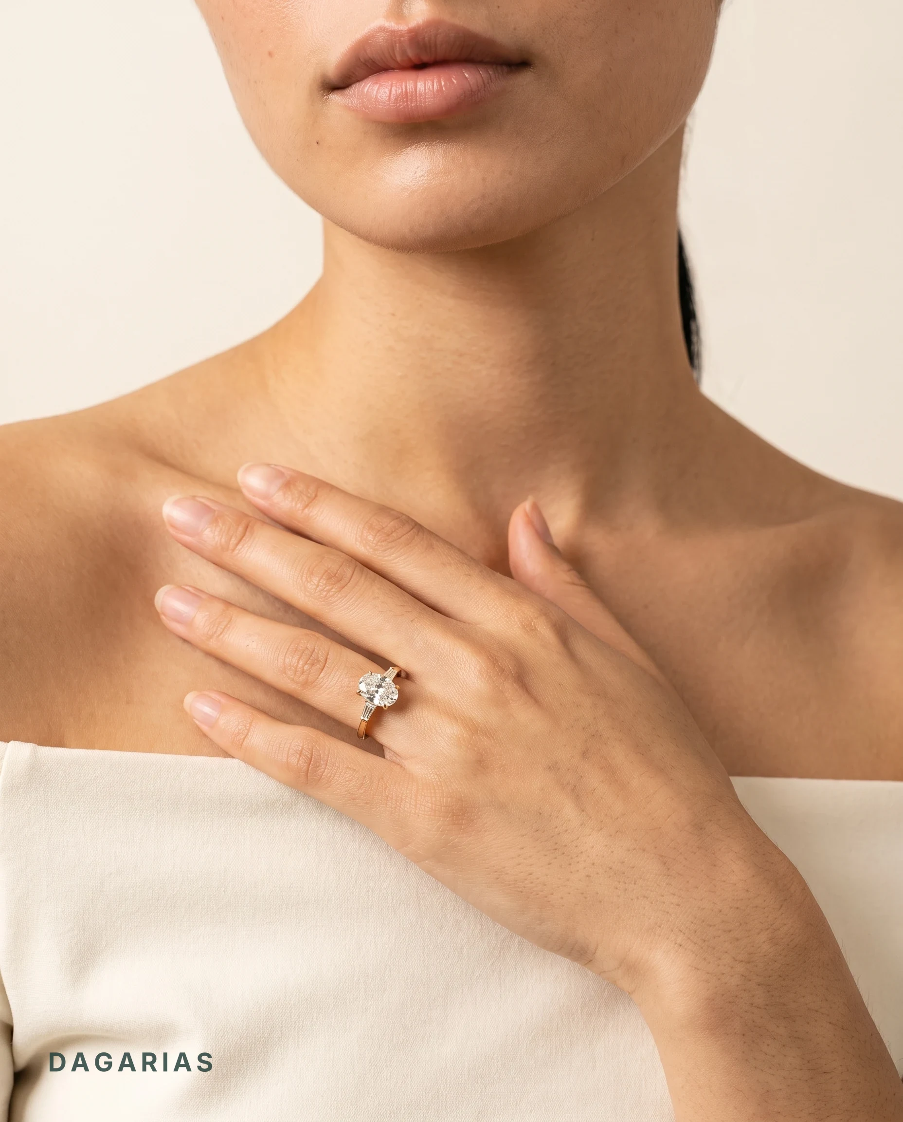 Orla, Oval Solitaire, Baguette Sides in Yellow Gold, oval, worn