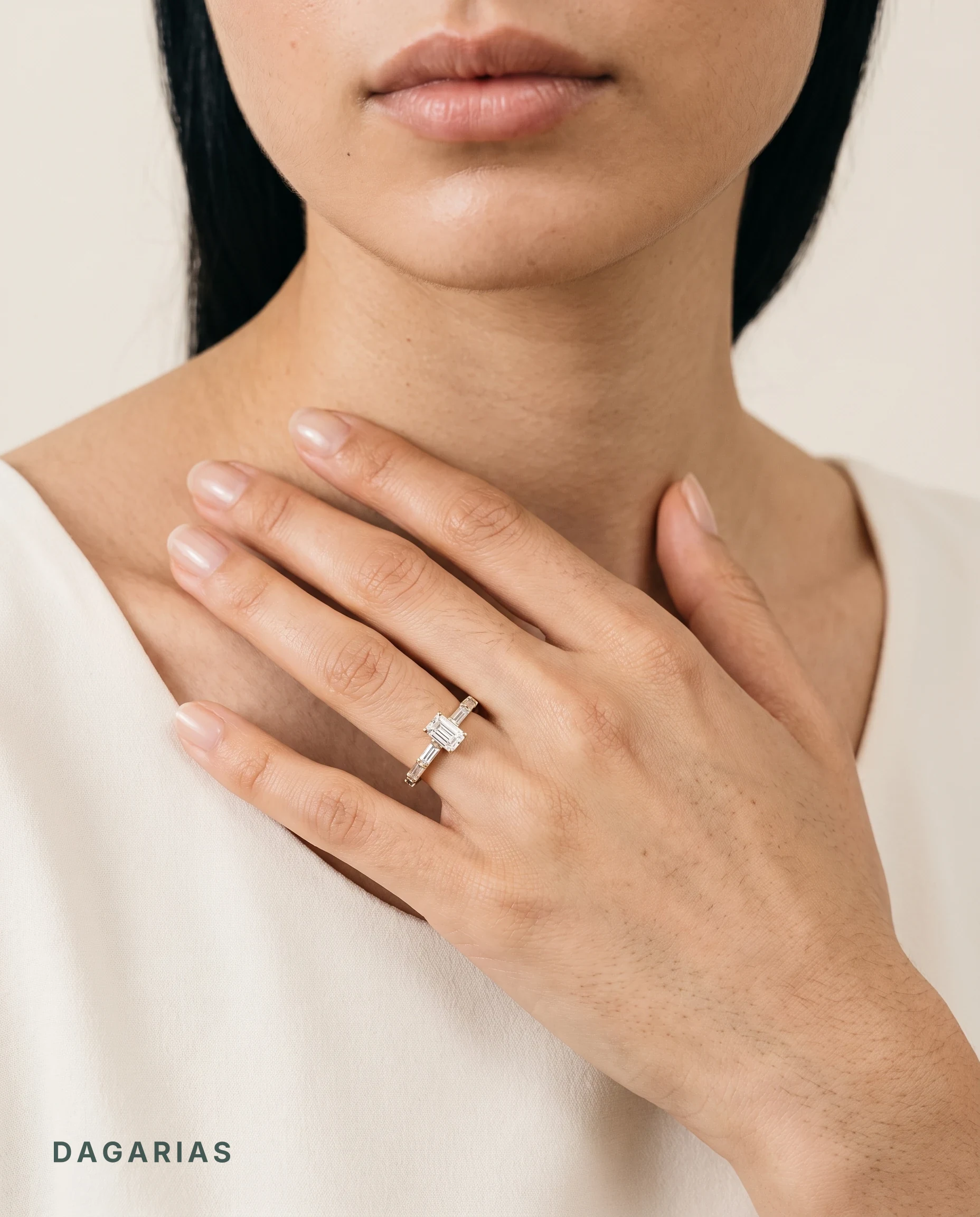 Octavia, Baguette Band with an Emerald Cut at the Centre in Yellow Gold, emerald, worn