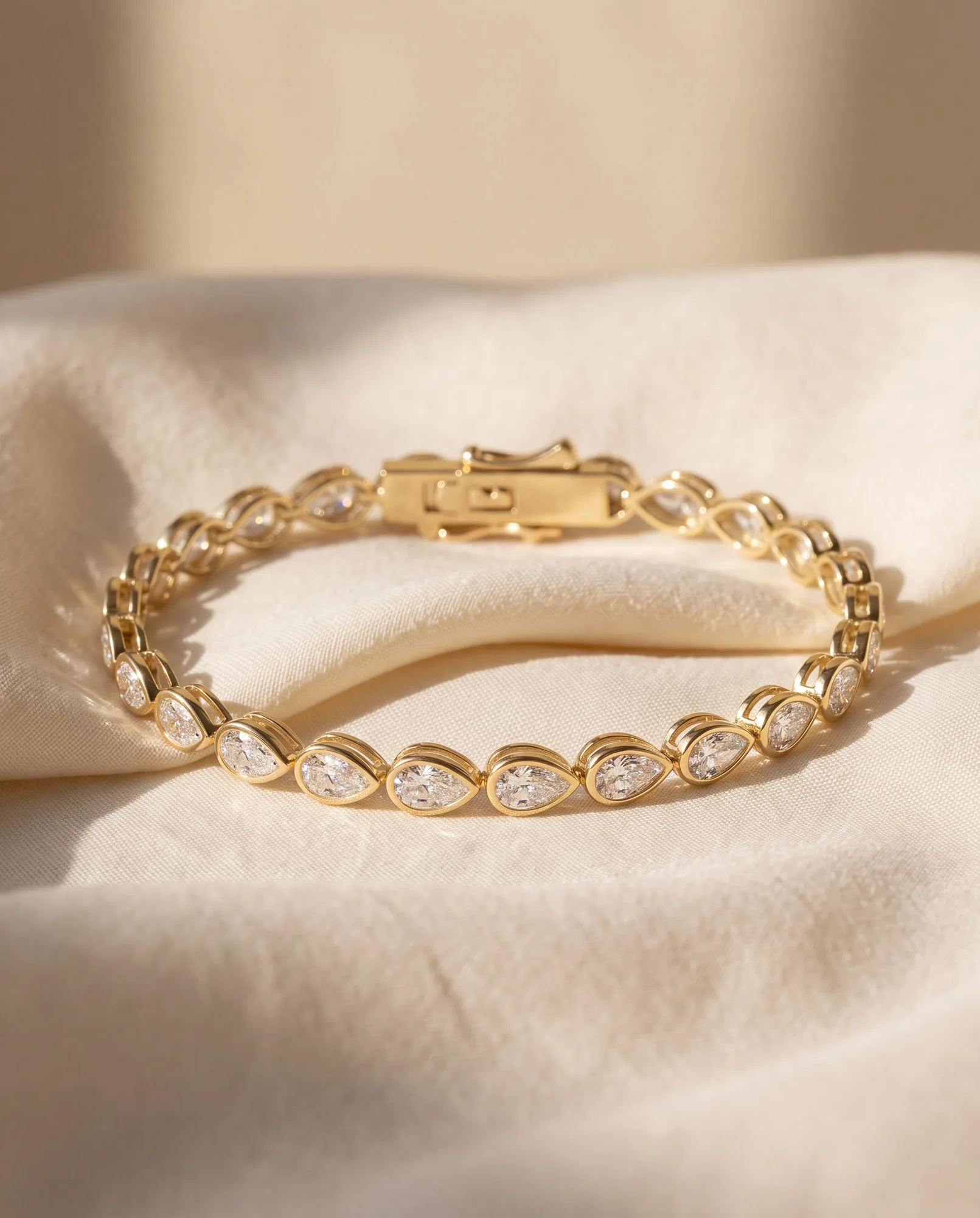 Lullaby Pear, Pear East-West Bezel Bracelet in Yellow Gold, pear