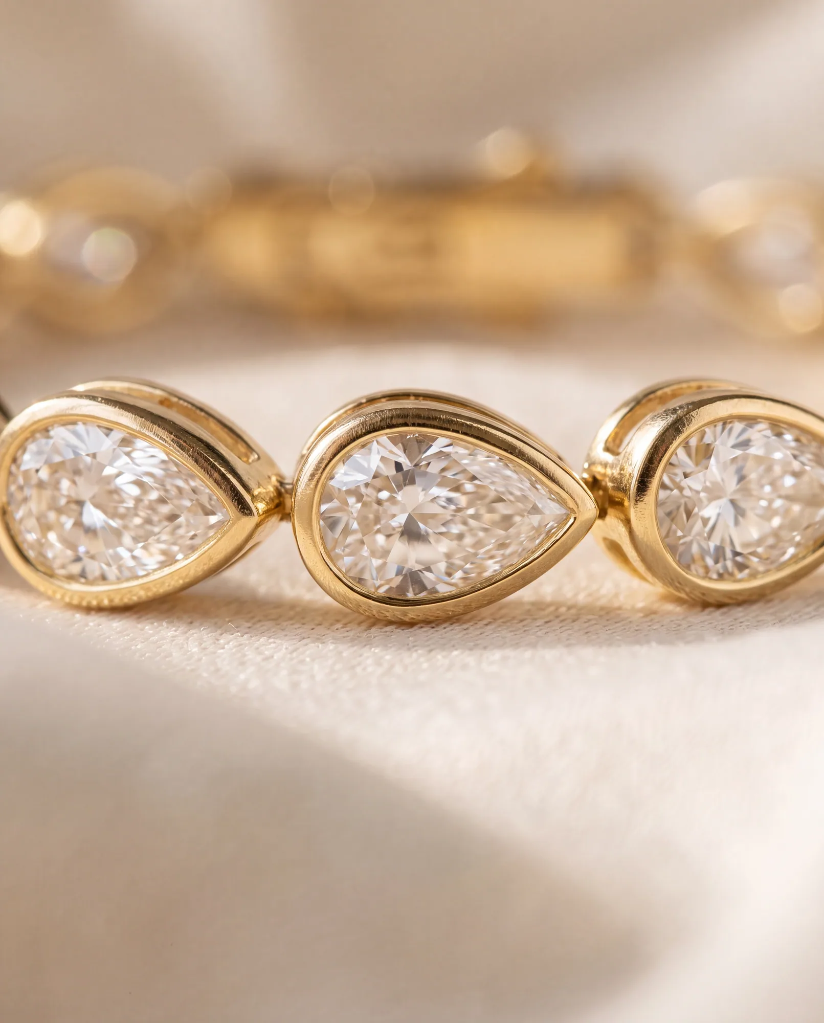 Lullaby Pear, Pear East-West Bezel Bracelet in Yellow Gold, pear, side profile