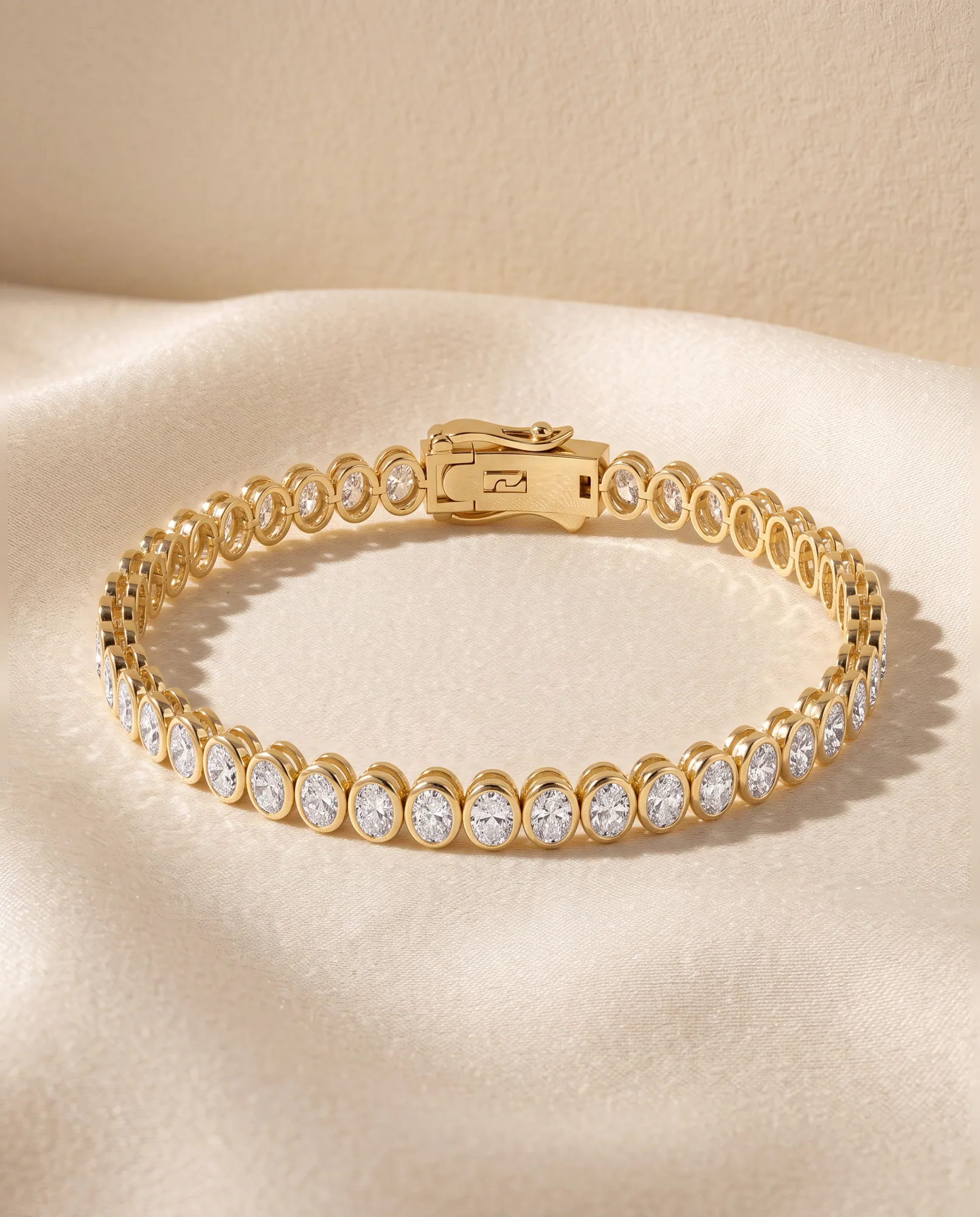 Ovation Oval, Oval North-South Bezel Bracelet in Yellow Gold, oval