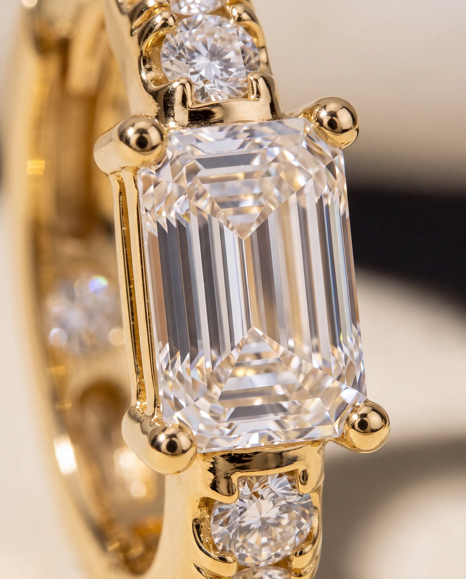 Orbit Emerald, Emerald-Cut Centre Diamond Hoops in Yellow Gold, emerald, side profile