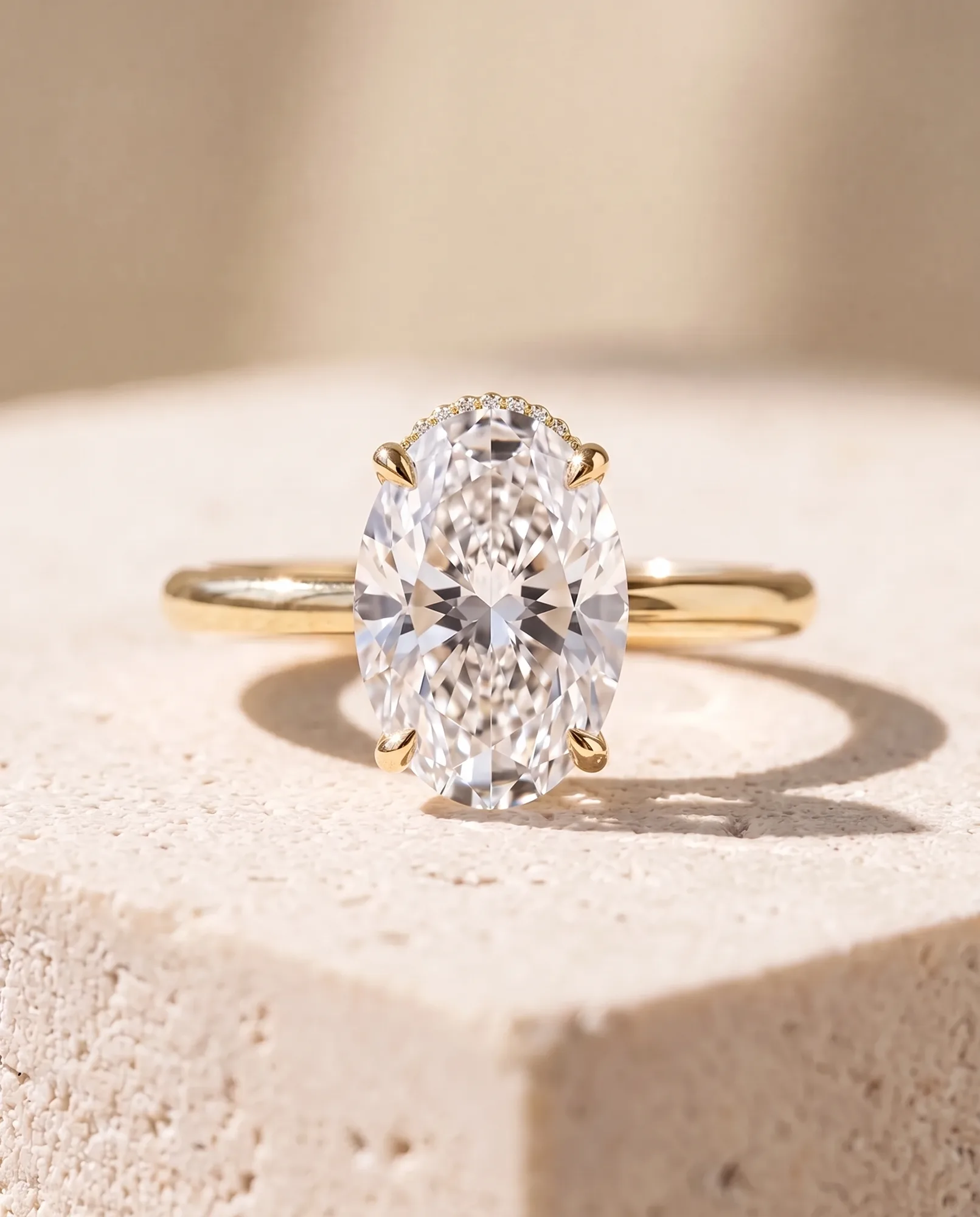Secret Oval, Oval Hidden-Halo Solitaire in Yellow Gold, oval