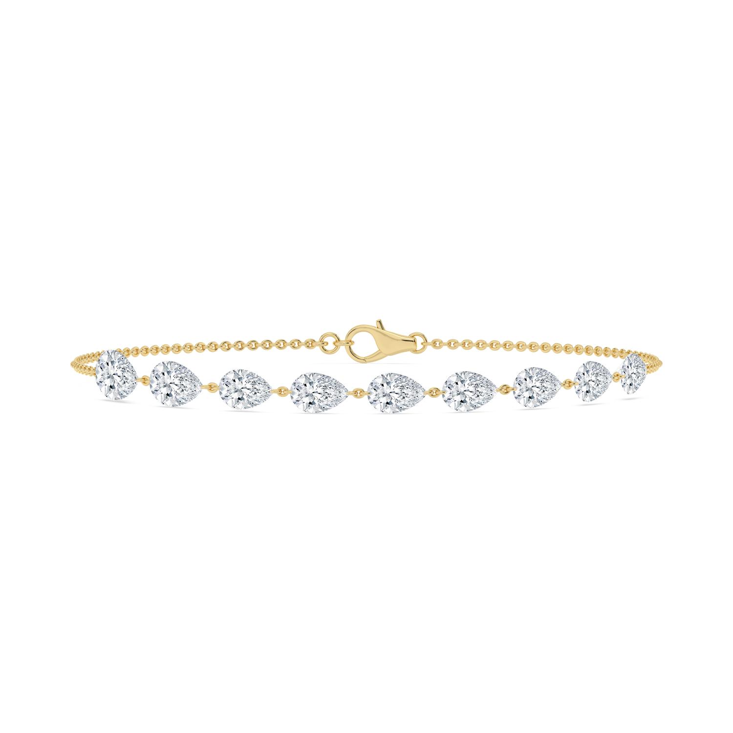 Josephine, Chain Bracelet with Pear Stations in Yellow Gold, pear, plain background