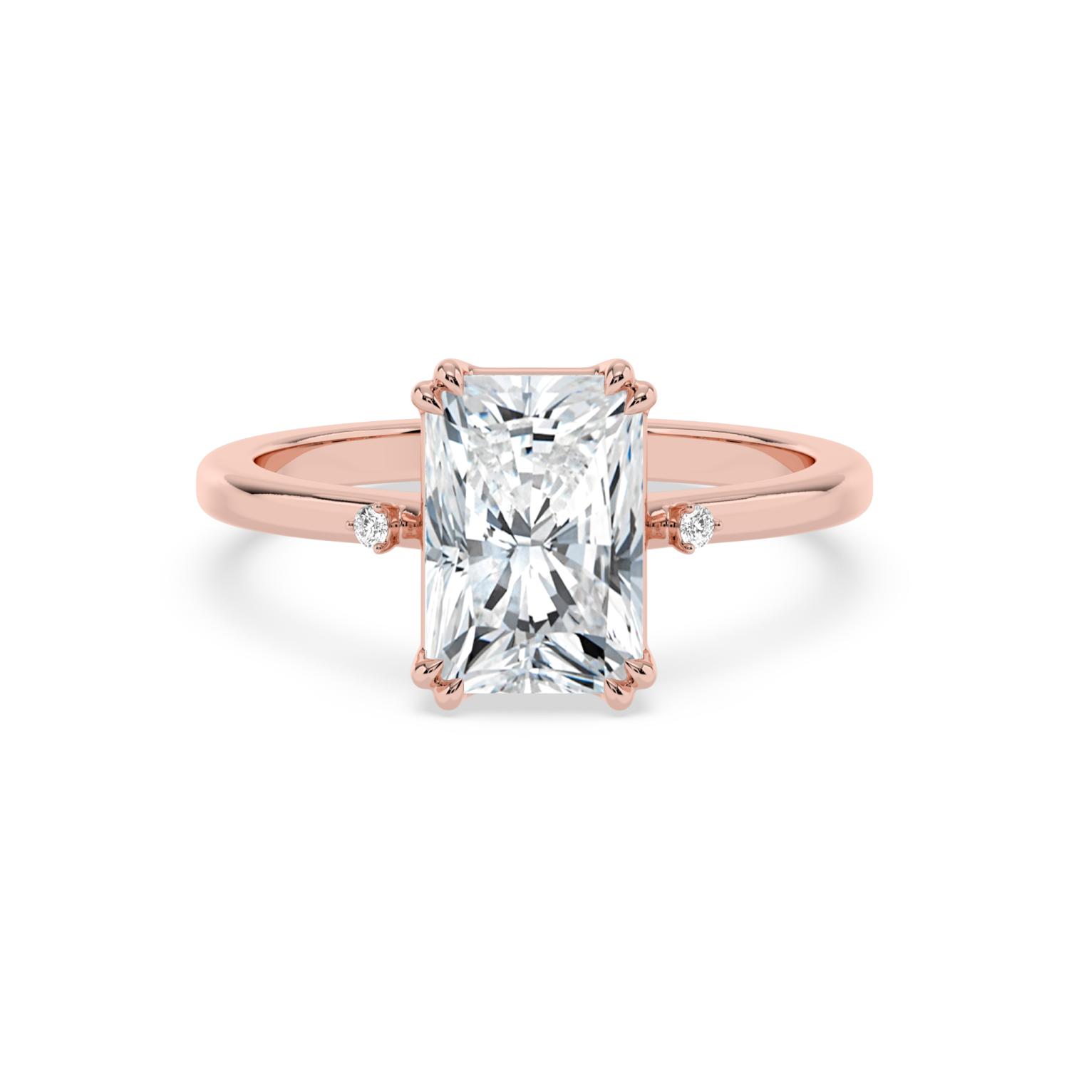 Maple, Four Prong Radiant Solitaire, One Small Stone Each Side in Rose Gold, radiant, plain background